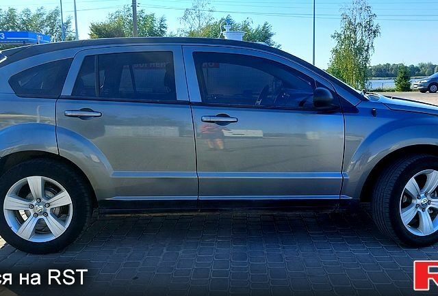 Сірий Додж Caliber, об'ємом двигуна 2 л та пробігом 289 тис. км за 6900 $, фото 2 на Automoto.ua