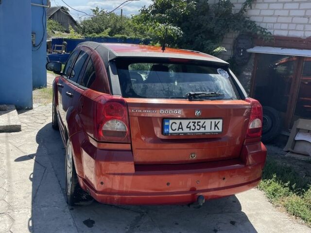 Помаранчевий Додж Caliber, об'ємом двигуна 2 л та пробігом 135 тис. км за 5800 $, фото 2 на Automoto.ua