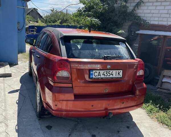 Оранжевый Додж Калибер, объемом двигателя 2 л и пробегом 135 тыс. км за 5600 $, фото 3 на Automoto.ua