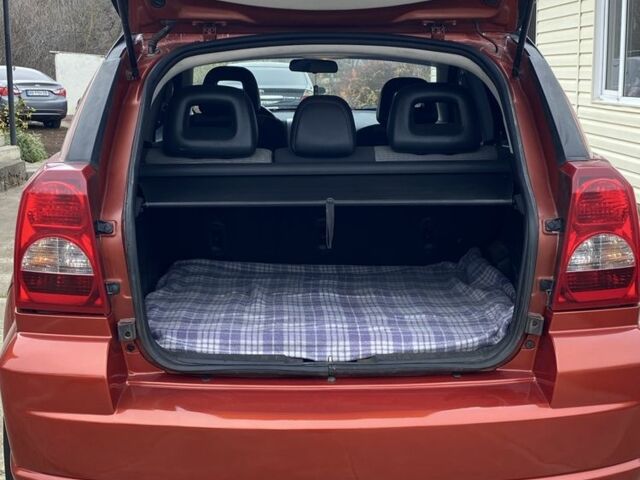 Оранжевый Додж Калибер, объемом двигателя 2 л и пробегом 294 тыс. км за 7800 $, фото 14 на Automoto.ua