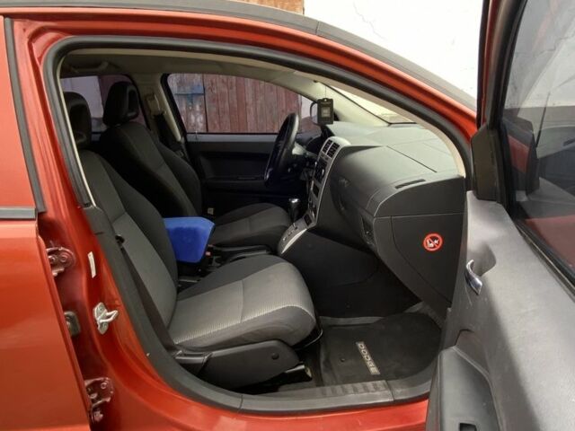 Оранжевый Додж Калибер, объемом двигателя 2 л и пробегом 294 тыс. км за 7800 $, фото 12 на Automoto.ua