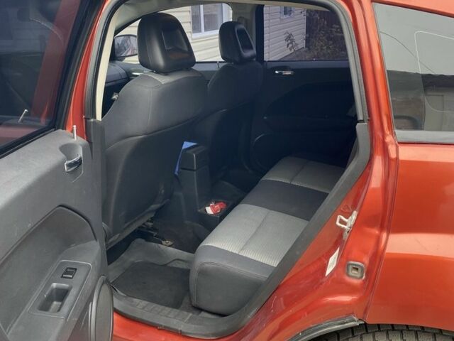 Оранжевый Додж Калибер, объемом двигателя 2 л и пробегом 294 тыс. км за 7800 $, фото 11 на Automoto.ua