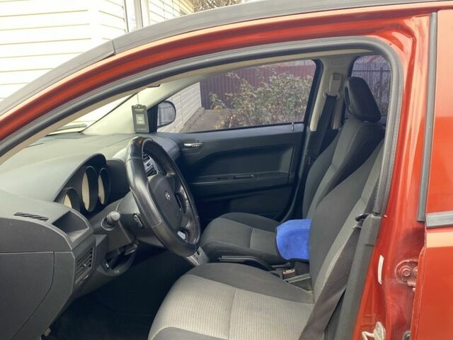 Оранжевый Додж Калибер, объемом двигателя 2 л и пробегом 294 тыс. км за 7800 $, фото 10 на Automoto.ua