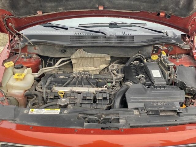 Оранжевый Додж Калибер, объемом двигателя 2 л и пробегом 294 тыс. км за 7800 $, фото 15 на Automoto.ua