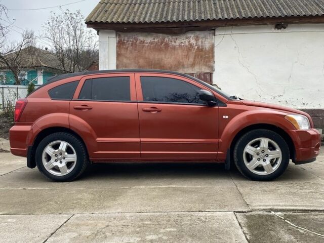 Оранжевый Додж Калибер, объемом двигателя 2 л и пробегом 294 тыс. км за 7800 $, фото 8 на Automoto.ua