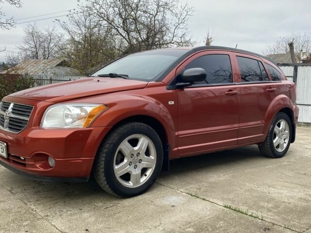 Оранжевый Додж Калибер, объемом двигателя 2 л и пробегом 294 тыс. км за 7800 $, фото 6 на Automoto.ua