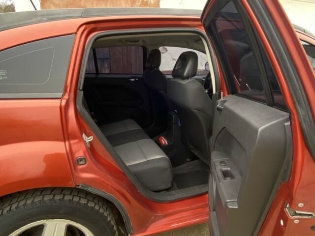 Оранжевый Додж Калибер, объемом двигателя 2 л и пробегом 294 тыс. км за 7800 $, фото 13 на Automoto.ua