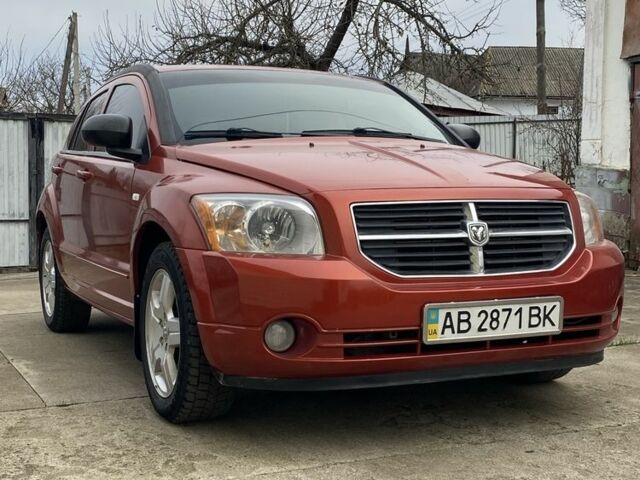 Оранжевый Додж Калибер, объемом двигателя 2 л и пробегом 294 тыс. км за 7800 $, фото 1 на Automoto.ua