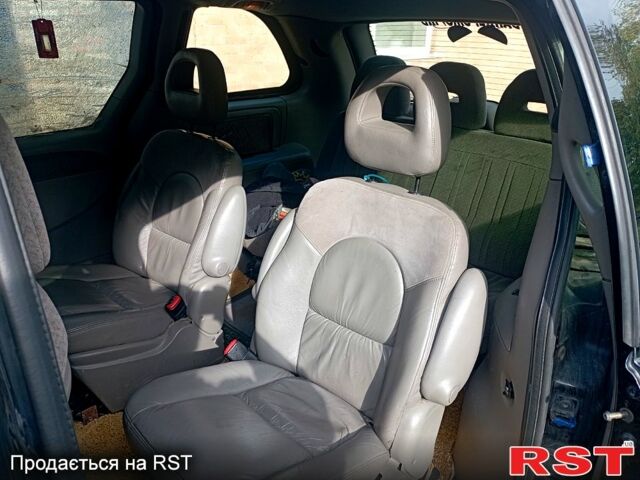 Черный Додж Караван, объемом двигателя 2.5 л и пробегом 316 тыс. км за 5000 $, фото 6 на Automoto.ua