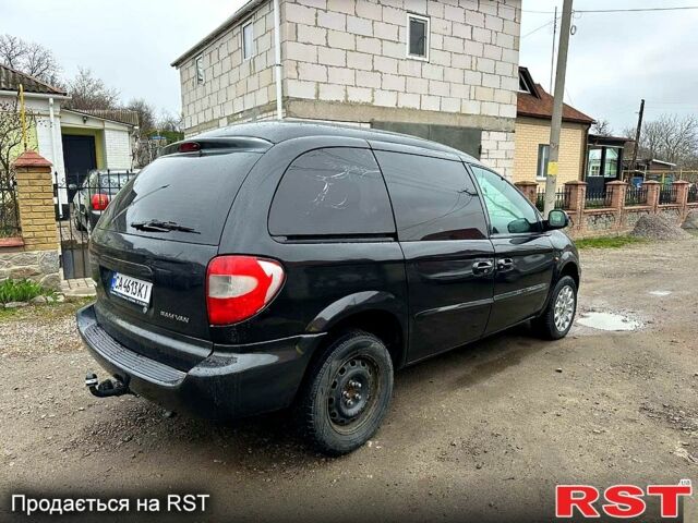 Чорний Додж Caravan, об'ємом двигуна 2.5 л та пробігом 333 тис. км за 2600 $, фото 6 на Automoto.ua