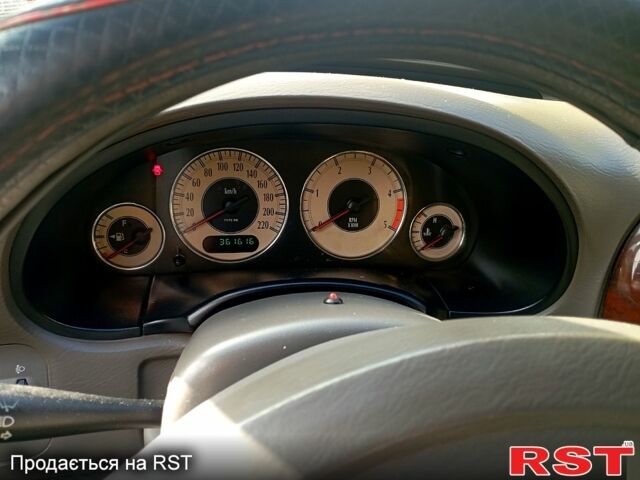 Черный Додж Караван, объемом двигателя 2.5 л и пробегом 316 тыс. км за 5000 $, фото 7 на Automoto.ua