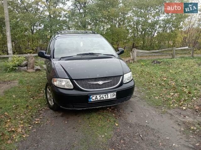 Черный Додж Караван, объемом двигателя 2.5 л и пробегом 360 тыс. км за 4700 $, фото 1 на Automoto.ua