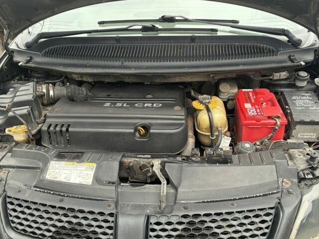 Черный Додж Караван, объемом двигателя 2.5 л и пробегом 393 тыс. км за 4000 $, фото 13 на Automoto.ua