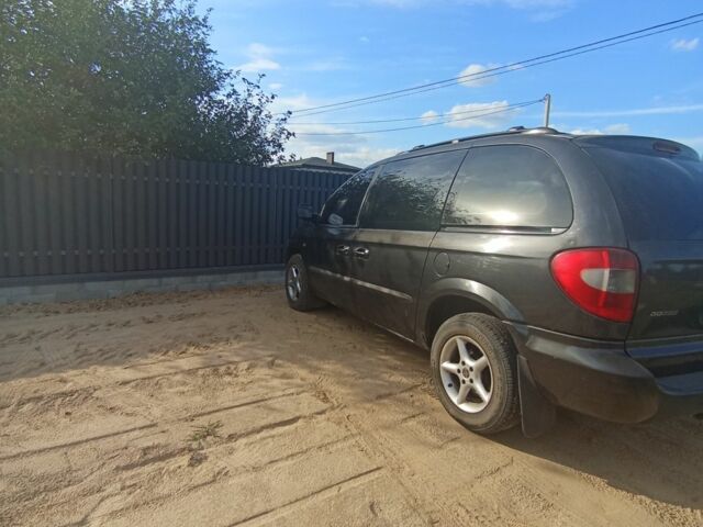 Чорний Додж Caravan, об'ємом двигуна 2 л та пробігом 1 тис. км за 3900 $, фото 1 на Automoto.ua