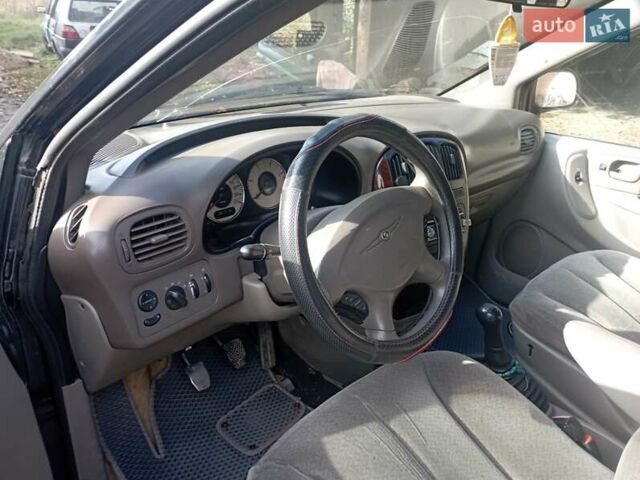 Черный Додж Караван, объемом двигателя 2.5 л и пробегом 360 тыс. км за 4700 $, фото 8 на Automoto.ua