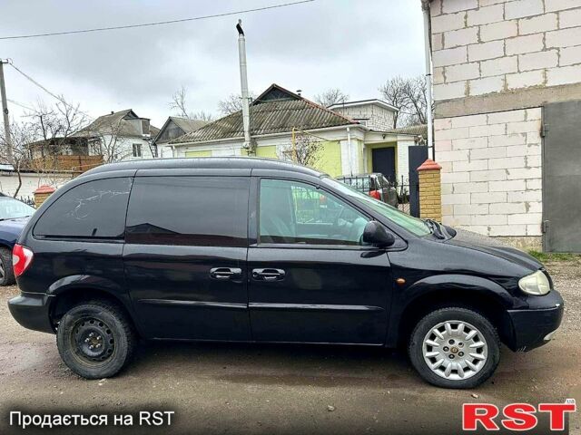 Чорний Додж Caravan, об'ємом двигуна 2.5 л та пробігом 333 тис. км за 2600 $, фото 3 на Automoto.ua