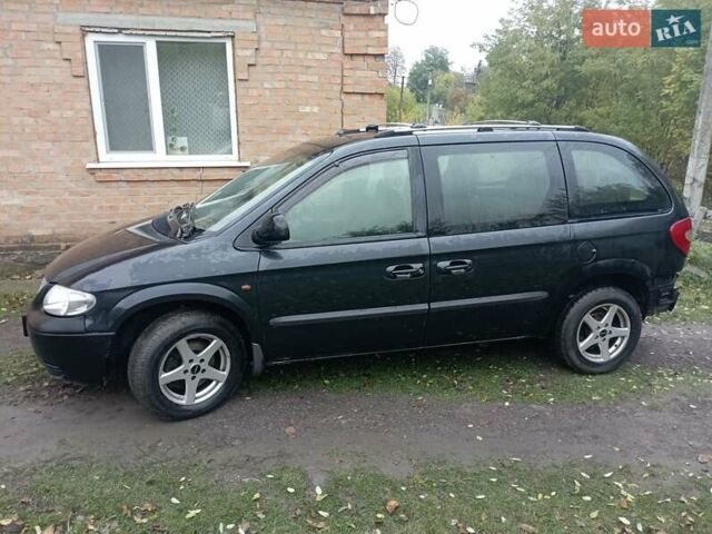 Черный Додж Караван, объемом двигателя 2.5 л и пробегом 360 тыс. км за 4700 $, фото 4 на Automoto.ua