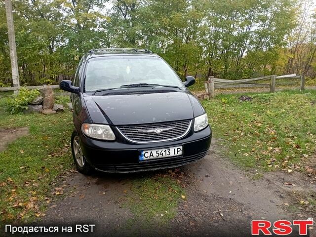 Черный Додж Караван, объемом двигателя 2.5 л и пробегом 316 тыс. км за 5000 $, фото 1 на Automoto.ua