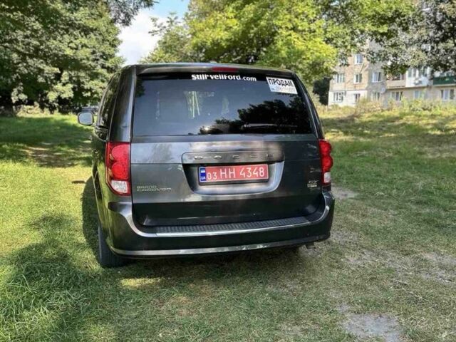 Черный Додж Караван, объемом двигателя 3.6 л и пробегом 117 тыс. км за 13500 $, фото 1 на Automoto.ua