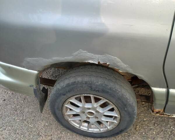 Серый Додж Караван, объемом двигателя 2.97 л и пробегом 300 тыс. км за 900 $, фото 13 на Automoto.ua