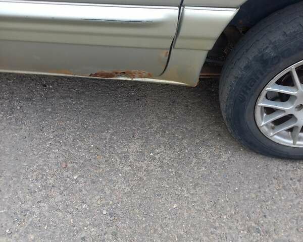 Серый Додж Караван, объемом двигателя 2.97 л и пробегом 300 тыс. км за 900 $, фото 11 на Automoto.ua