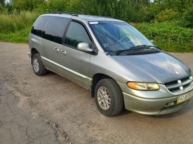 Серый Додж Караван, объемом двигателя 3 л и пробегом 400 тыс. км за 900 $, фото 1 на Automoto.ua