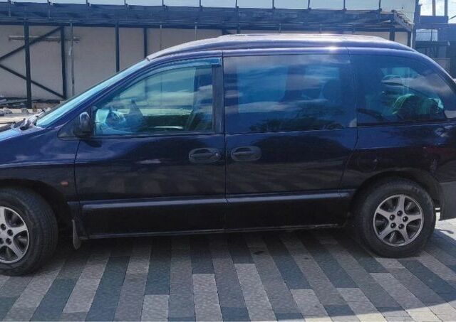 Синий Додж Караван, объемом двигателя 2.5 л и пробегом 300 тыс. км за 2700 $, фото 1 на Automoto.ua