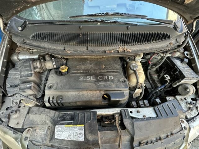 Зелений Додж Caravan, об'ємом двигуна 2.5 л та пробігом 300 тис. км за 1300 $, фото 1 на Automoto.ua