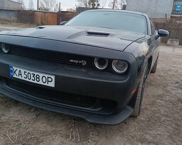 Черный Додж Челенджер, объемом двигателя 5.65 л и пробегом 192 тыс. км за 19500 $, фото 2 на Automoto.ua