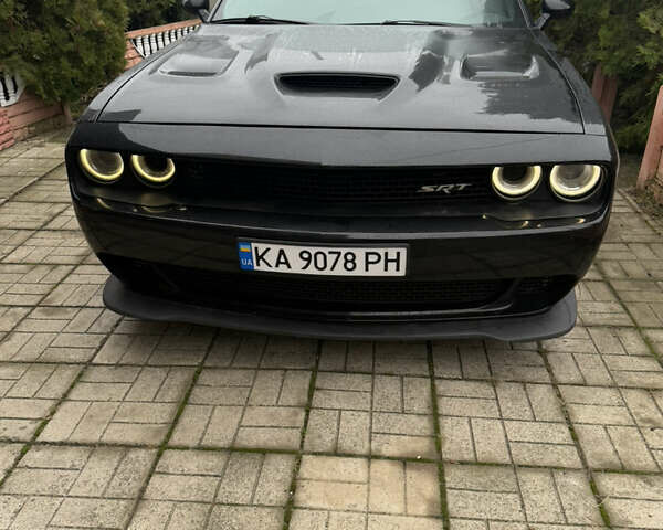Черный Додж Челенджер, объемом двигателя 5.65 л и пробегом 180 тыс. км за 21500 $, фото 7 на Automoto.ua