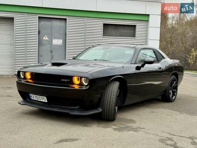 Черный Додж Челенджер, объемом двигателя 5.65 л и пробегом 132 тыс. км за 25500 $, фото 14 на Automoto.ua