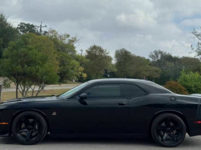 Черный Додж Челенджер, объемом двигателя 6.4 л и пробегом 75 тыс. км за 9300 $, фото 3 на Automoto.ua