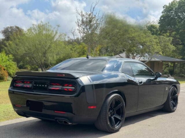 Черный Додж Челенджер, объемом двигателя 6.4 л и пробегом 75 тыс. км за 9300 $, фото 4 на Automoto.ua