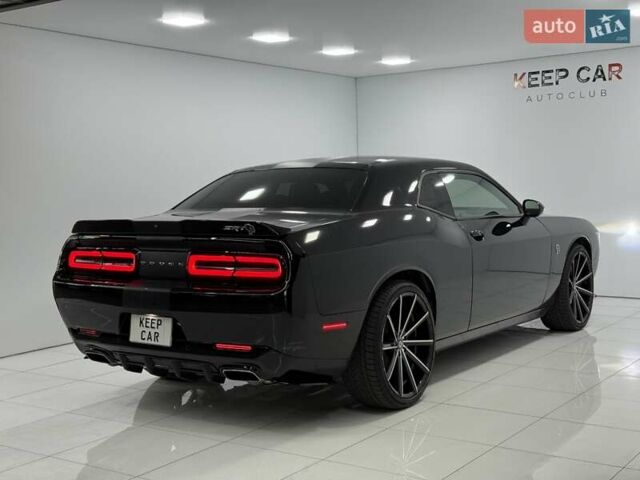 Черный Додж Челенджер, объемом двигателя 3.6 л и пробегом 100 тыс. км за 19000 $, фото 12 на Automoto.ua