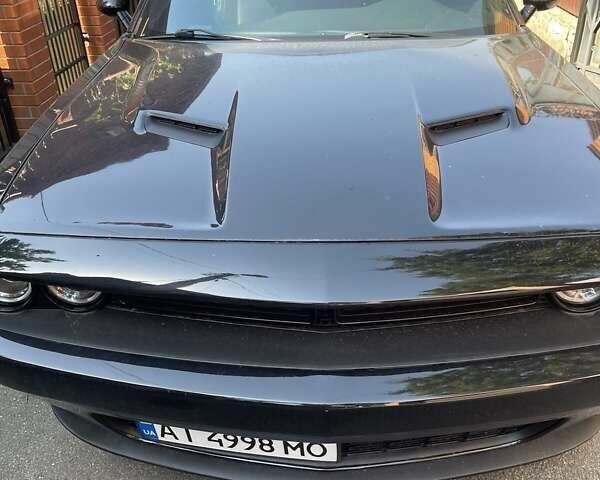 Черный Додж Челенджер, объемом двигателя 3.6 л и пробегом 145 тыс. км за 18900 $, фото 1 на Automoto.ua