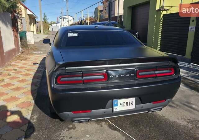 Черный Додж Челенджер, объемом двигателя 5.65 л и пробегом 139 тыс. км за 27000 $, фото 19 на Automoto.ua