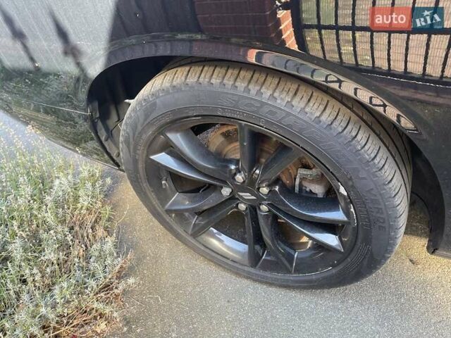 Черный Додж Челенджер, объемом двигателя 3.6 л и пробегом 145 тыс. км за 18900 $, фото 3 на Automoto.ua