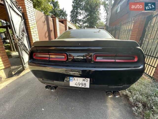 Черный Додж Челенджер, объемом двигателя 3.6 л и пробегом 145 тыс. км за 18900 $, фото 4 на Automoto.ua