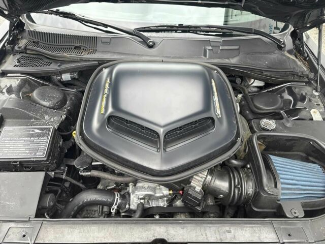 Черный Додж Челенджер, объемом двигателя 6.4 л и пробегом 48 тыс. км за 14800 $, фото 10 на Automoto.ua