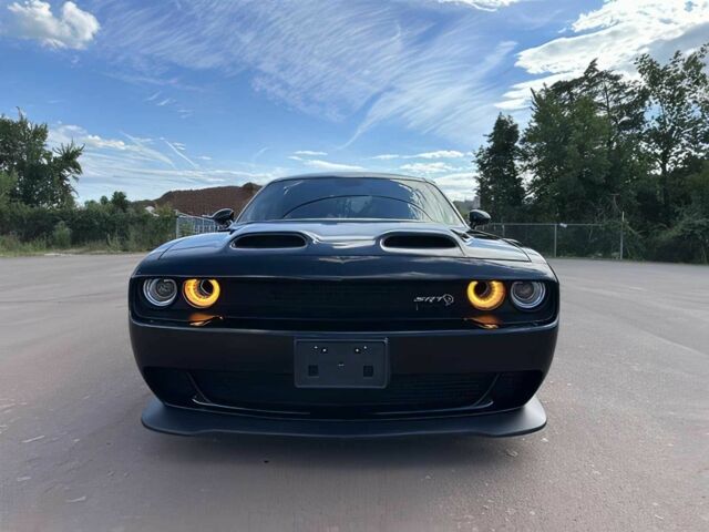 Черный Додж Челенджер, объемом двигателя 6.2 л и пробегом 29 тыс. км за 12000 $, фото 1 на Automoto.ua