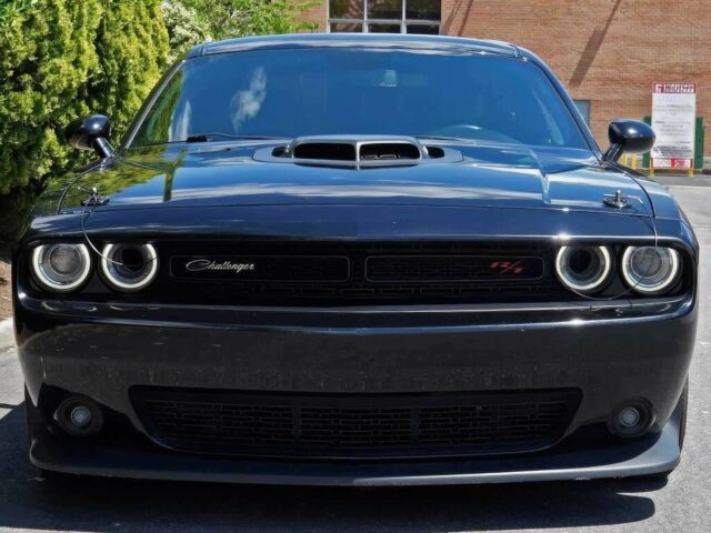 Черный Додж Челенджер, объемом двигателя 6.4 л и пробегом 25 тыс. км за 5800 $, фото 1 на Automoto.ua