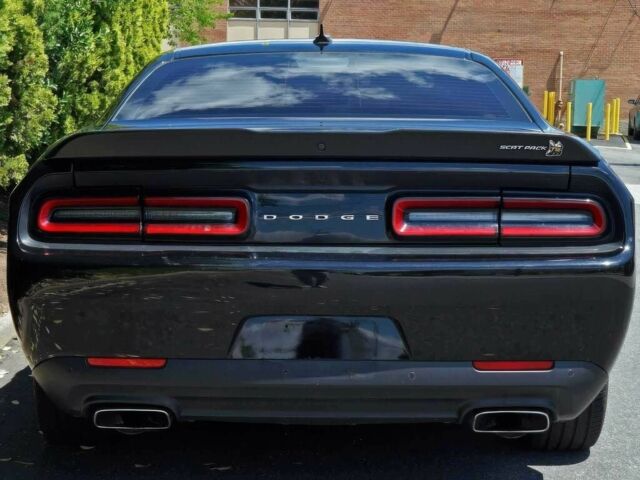 Черный Додж Челенджер, объемом двигателя 6.4 л и пробегом 25 тыс. км за 5800 $, фото 3 на Automoto.ua