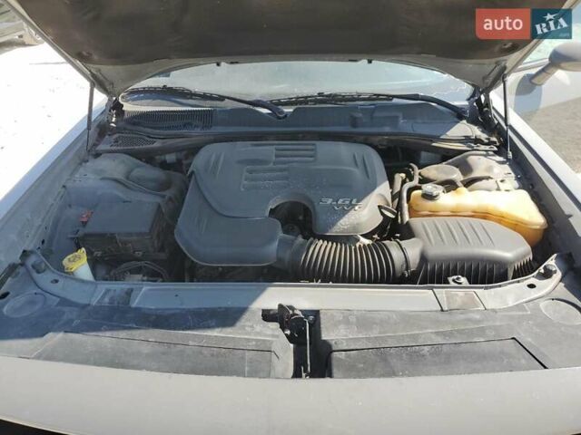 Серый Додж Челенджер, объемом двигателя 3.6 л и пробегом 148 тыс. км за 4100 $, фото 10 на Automoto.ua