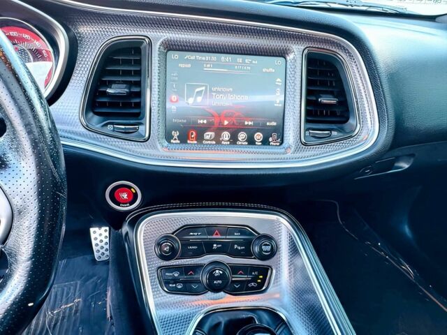 Синій Додж Challenger, об'ємом двигуна 6.2 л та пробігом 70 тис. км за 11400 $, фото 11 на Automoto.ua