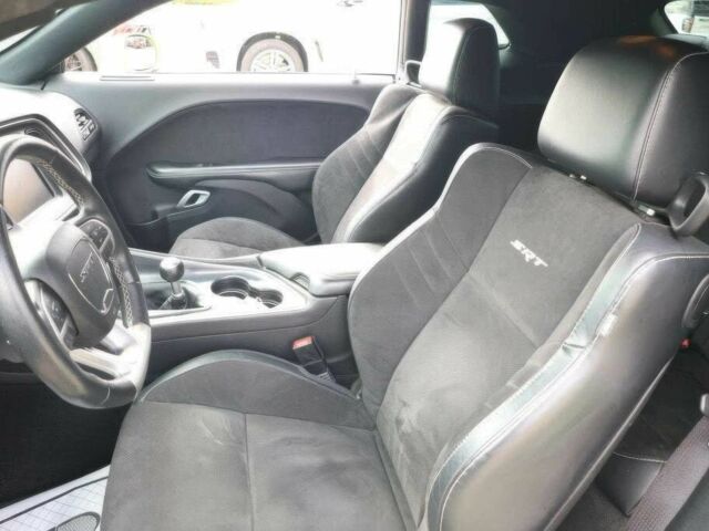 Зеленый Додж Челенджер, объемом двигателя 6.4 л и пробегом 77 тыс. км за 7800 $, фото 8 на Automoto.ua