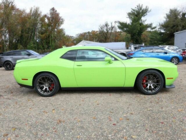 Зеленый Додж Челенджер, объемом двигателя 6.4 л и пробегом 77 тыс. км за 7800 $, фото 6 на Automoto.ua