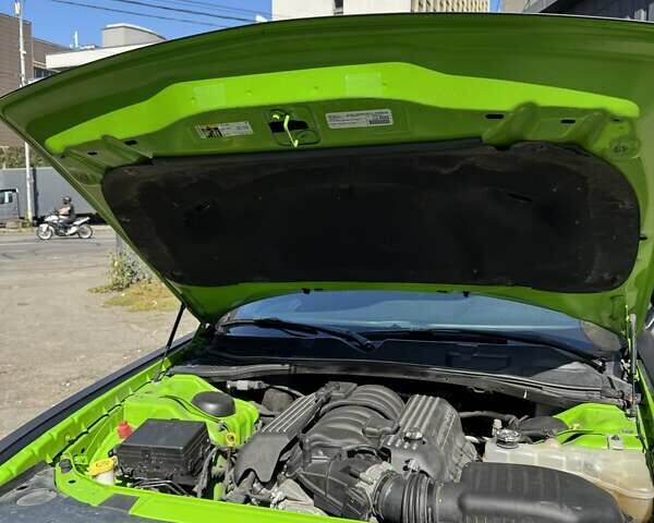 Зелений Додж Challenger, об'ємом двигуна 6.42 л та пробігом 78 тис. км за 33500 $, фото 14 на Automoto.ua