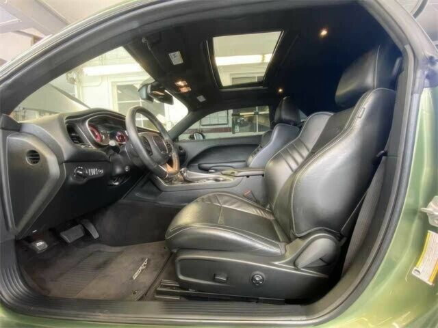 Додж Челенджер 2018 в Львове на Automoto.ua Зеленый Додж Челенджер, объемом двигателя 6.2 л и пробегом 33 тыс. км за 17000 $, фото 7 на Automoto.ua