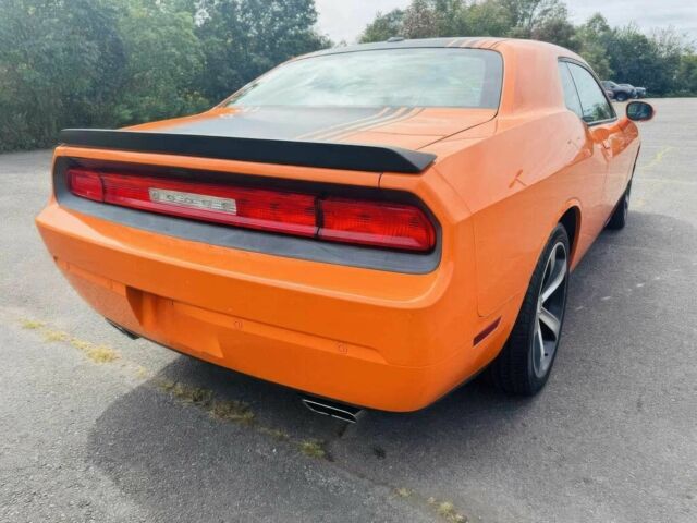 Оранжевый Додж Челенджер, объемом двигателя 5.7 л и пробегом 88 тыс. км за 4100 $, фото 3 на Automoto.ua