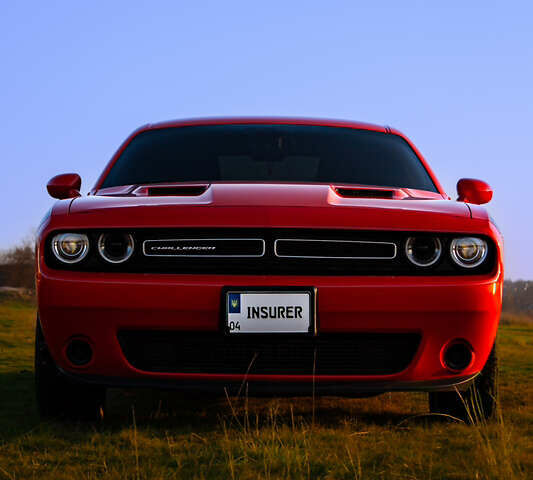 Оранжевый Додж Челенджер, объемом двигателя 3.6 л и пробегом 96 тыс. км за 18990 $, фото 1 на Automoto.ua